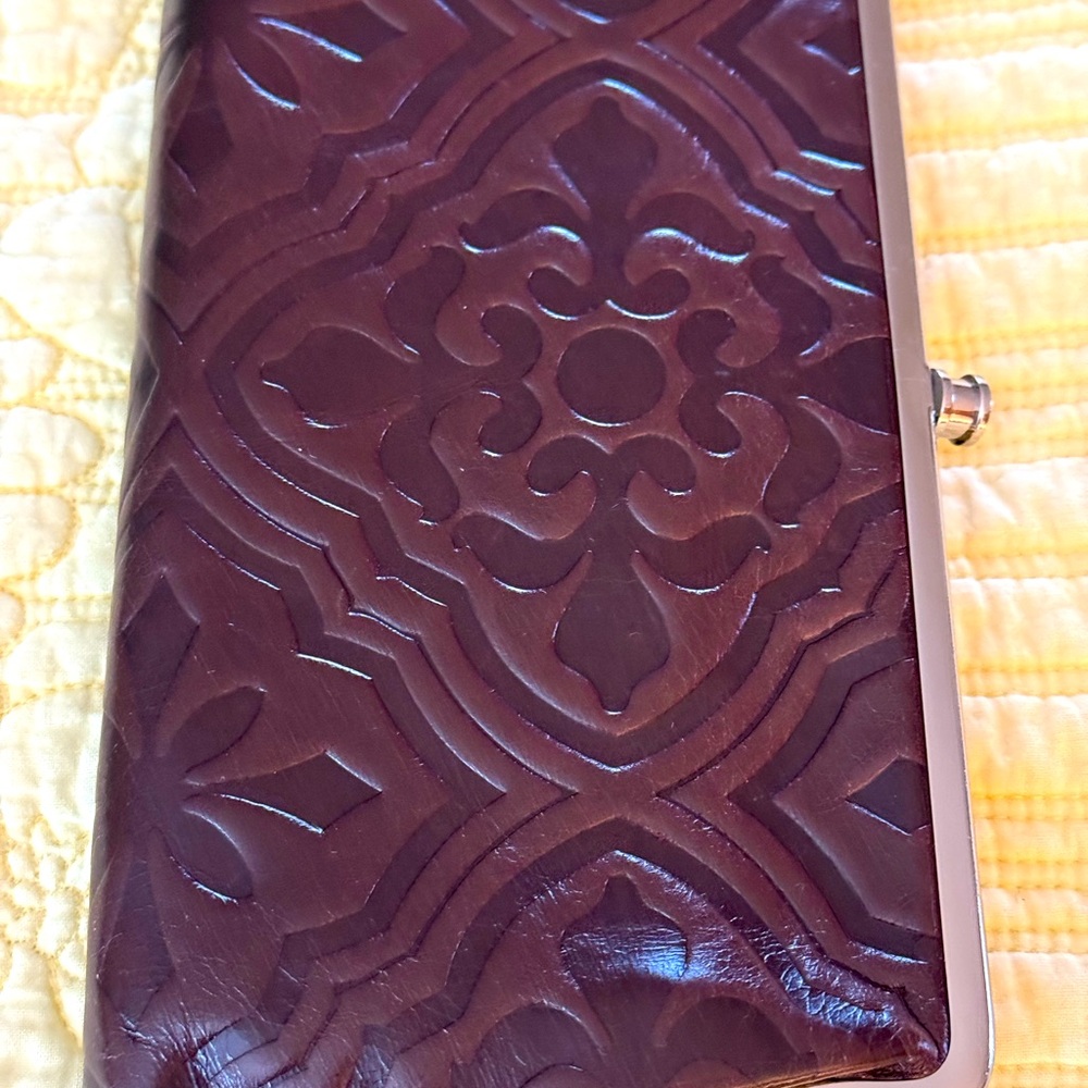 Gorgeous brown tooled leather clutch/wallet. Hobo brand.